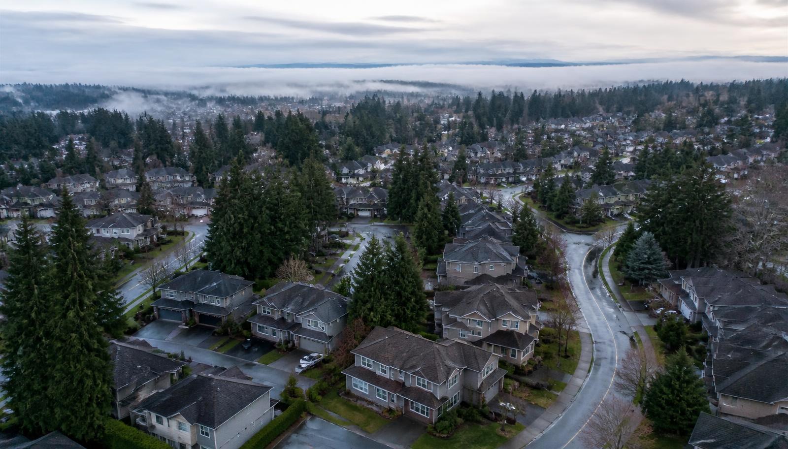 Aerial view of a Surrey, BC neighborhood in coastal fog — Demo Plumbing Company 2's primary service area